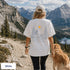 Comfort Colors 1717 unisex t-shirt featuring a coordinating left chest pocket design and large outdoor-inspired back graphic, shown in a lifestyle setting and available in multiple garment-dyed colours.