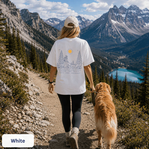 Comfort Colors 1717 unisex t-shirt featuring a coordinating left chest pocket design and large outdoor-inspired back graphic, shown in a lifestyle setting and available in multiple garment-dyed colours.