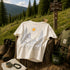 Comfort Colors 1717 unisex t-shirt featuring a coordinating left chest pocket design and large outdoor-inspired back graphic, shown in a lifestyle setting and available in multiple garment-dyed colours.