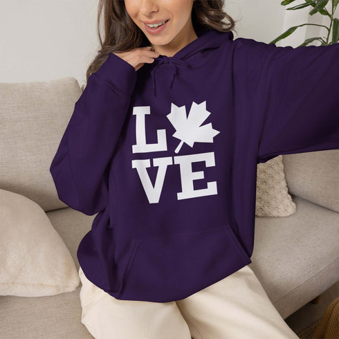 Canada LOVE hoodie with Canadian maple leaf graphic on a purple unisex sweatshirt