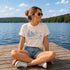 Livin' On Lake Time t-shirt featuring a lakeside chair and dock design inspired by Manitoba lake life and cottage weekends.