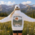 Vintage outdoor hoodie featuring a matching left chest graphic and a large back design inspired by hiking, forests, mountains, and adventure on a premium unisex hoodie displayed in an outdoor lifestyle setting.