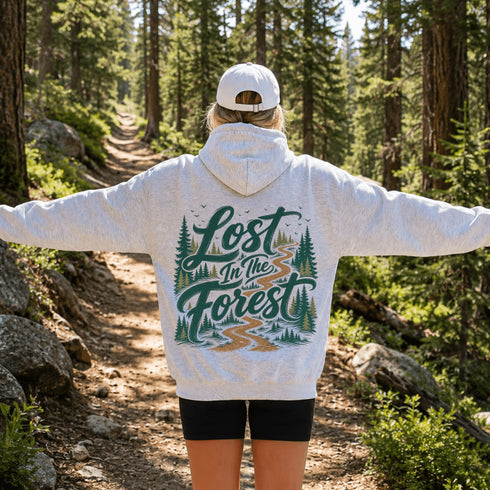 Vintage-inspired hiking hoodie featuring a matching left chest graphic and large outdoor-themed back design on a unisex heavy blend hoodie shown in lifestyle and flat lay mockups.