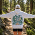 Vintage-inspired hiking hoodie featuring a matching left chest graphic and large outdoor-themed back design on a unisex heavy blend hoodie shown in lifestyle and flat lay mockups.