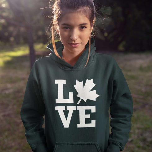 Canada LOVE hoodie with Canadian maple leaf graphic on a forest green unisex sweatshirt