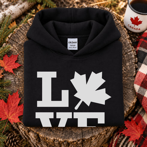 Canada LOVE hoodie with Canadian maple leaf graphic on a black unisex sweatshirt