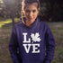 Canada LOVE hoodie with Canadian maple leaf graphic on a navy unisex sweatshirt