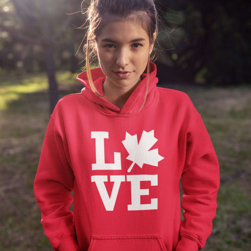 Canada LOVE hoodie with Canadian maple leaf graphic on a red unisex sweatshirt