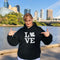 Canada LOVE hoodie with Canadian maple leaf graphic on a black unisex sweatshirt