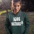 Person wearing a green hoodie with 'Love Nature' text in a natural setting