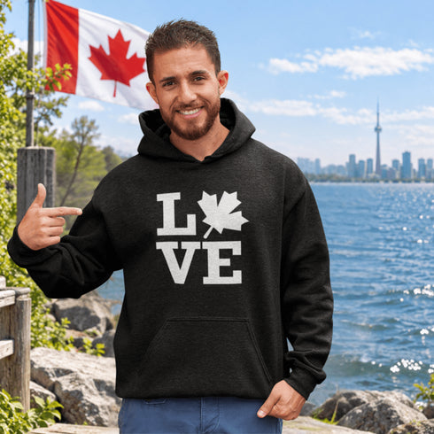 Canada LOVE hoodie with Canadian maple leaf graphic on a black unisex sweatshirt
