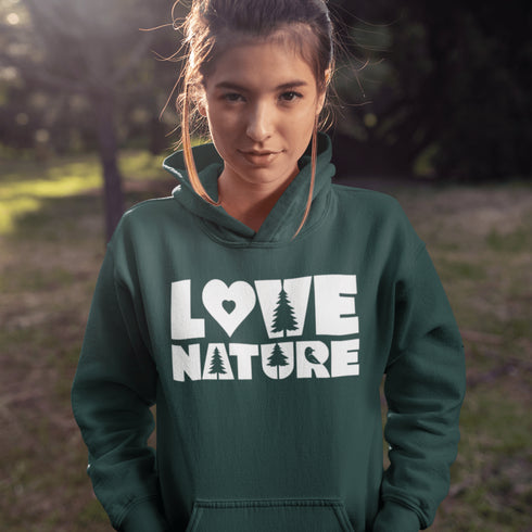 Person wearing a green hoodie with 'Love Nature' text in a natural setting