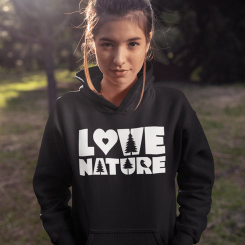Person wearing a black hoodie with 'Love Nature' text in a natural setting