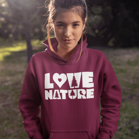 Person wearing a maroon hoodie with 'Love Nature' text in a natural setting