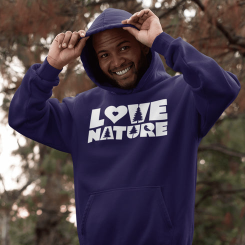 Person wearing a purple hoodie with 'LOVE NATURE' text, standing outdoors.