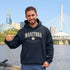 Manitoba Rooted in the Heartland hoodie with maple leaf and vintage collegiate lettering on a unisex Gildan sweatshirt