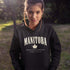 Manitoba Rooted in the Heartland hoodie with maple leaf and vintage collegiate lettering on a unisex Gildan sweatshirt