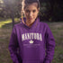 Manitoba Rooted in the Heartland hoodie with maple leaf and vintage collegiate lettering on a unisex Gildan sweatshirt