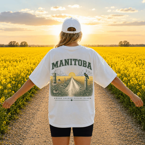 Vintage Manitoba prairie landscape graphic t-shirt featuring a matching left chest design and oversized back print on a Comfort Colors 1717 garment-dyed unisex t-shirt available in multiple colors. Perfect for outdoor adventures, country living, camping, travel, and everyday wear.