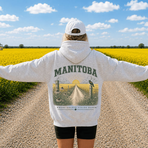Vintage-inspired Manitoba prairie hoodie featuring a matching left chest design and oversized back graphic shown on a unisex hoodie lifestyle mockup with outdoor-inspired accessories. Available in multiple hoodie colors.