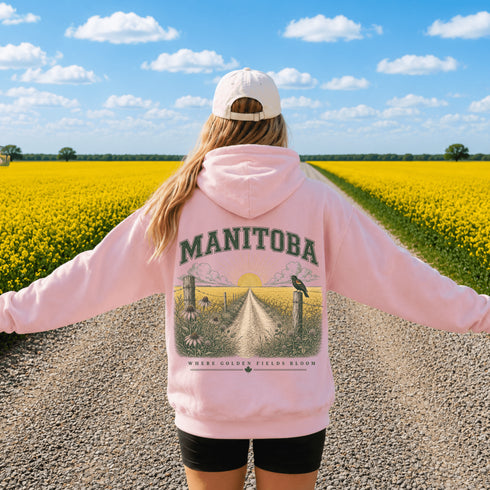 Vintage-inspired Manitoba prairie hoodie featuring a matching left chest design and oversized back graphic shown on a unisex hoodie lifestyle mockup with outdoor-inspired accessories. Available in multiple hoodie colors.