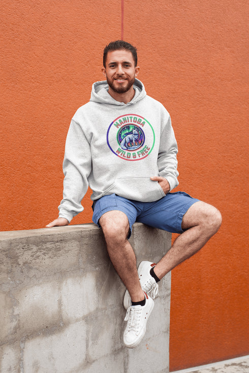 Unleash your wild side with our Manitoba – Wild & Free hoodie, featuring an enchanting graphic of an arctic fox beneath the dazzling northern lights.