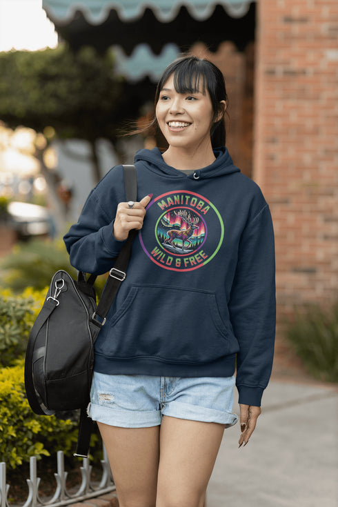 Stay connected to the wild with our Manitoba – Wild & Free hoodie, featuring a majestic deer standing under the vibrant northern lights.