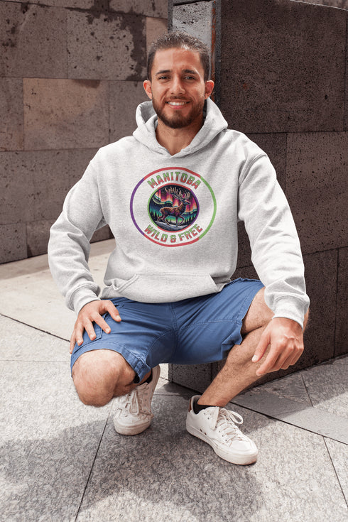 Stay connected to the wild with our Manitoba – Wild & Free hoodie, featuring a majestic deer standing under the vibrant northern lights.