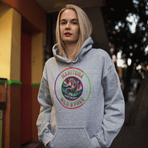 Stay connected to the wild with our Manitoba – Wild & Free hoodie, featuring a majestic deer standing under the vibrant northern lights.