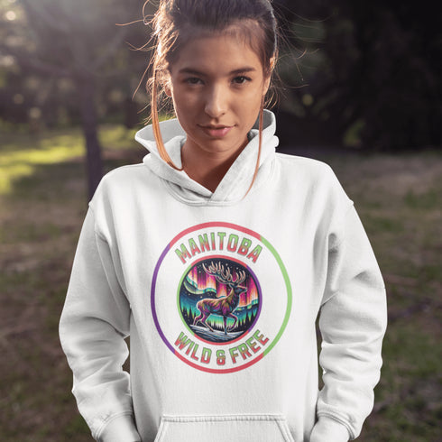 Stay connected to the wild with our Manitoba – Wild & Free hoodie, featuring a majestic deer standing under the vibrant northern lights.