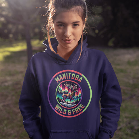 Stay connected to the wild with our Manitoba – Wild & Free hoodie, featuring a majestic deer standing under the vibrant northern lights.