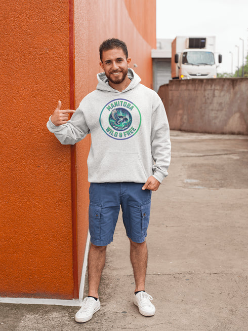 Embrace the magic of the prairies with our Manitoba – Wild & Free hoodie, featuring a captivating graphic of a snowy owl in flight beneath the shimmering northern lights.