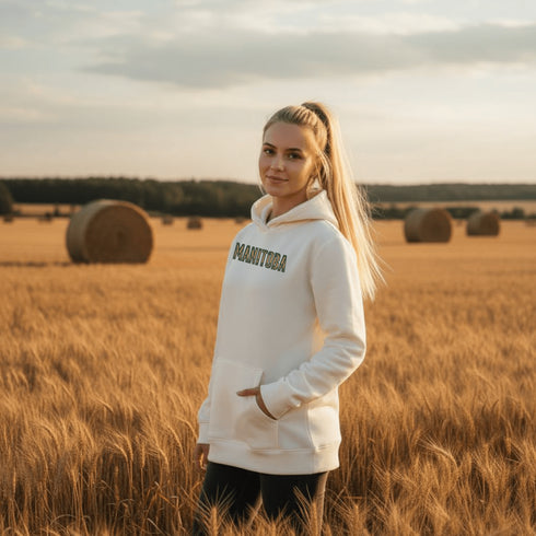 Stay cozy and stylish with this Manitoba-themed hoodie featuring the letters filled with wheat. Perfect for anyone looking for a cozy hoodie to wear during winter.