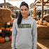 Stay cozy and stylish with this Manitoba-themed hoodie featuring the letters filled with wheat. Perfect for anyone looking for a cozy hoodie to wear during winter.