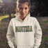 Stay cozy and stylish with this Manitoba-themed hoodie featuring the letters filled with wheat. Perfect for anyone looking for a cozy hoodie to wear during winter.