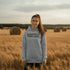 Stay cozy and stylish with this Manitoba-themed hoodie featuring the letters filled with wheat. Perfect for anyone looking for a cozy hoodie to wear during winter.
