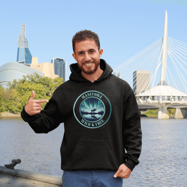 This hoodie brings the heart of Manitoba’s wilderness to life, featuring a majestic moose under the breathtaking glow of the Northern Lights.