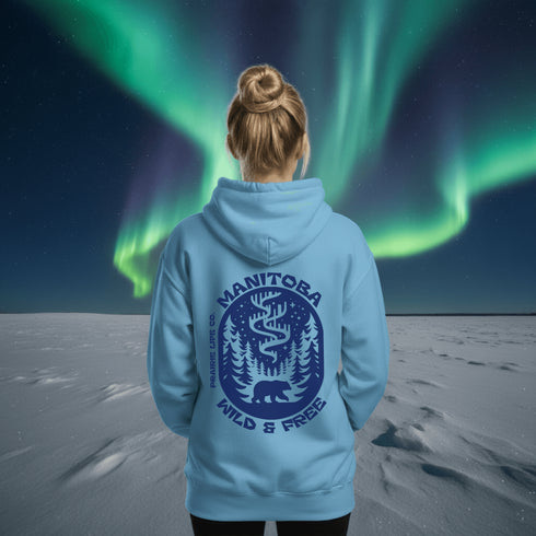 Wrap yourself in cozy prairie vibes with this beautifully designed Manitoba “Wild & Free” hoodie.