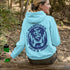 Wrap yourself in cozy prairie vibes with this beautifully designed Manitoba “Wild & Free” hoodie.