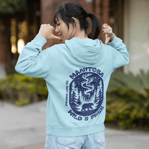 Wrap yourself in cozy prairie vibes with this beautifully designed Manitoba “Wild & Free” hoodie.