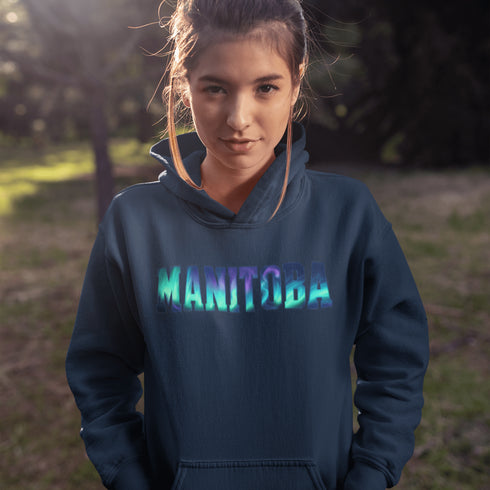 Our Manitoba Northern Lights Hoodie features the province’s name in a stunning aurora-inspired font that shimmers with the spirit of the North.