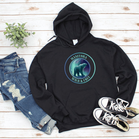 This hoodie brings the beauty of Manitoba’s north right to your wardrobe, featuring a fearless polar bear under the glow of the Northern Lights. With the bold Manitoba - Wild & Free slogan, you’ll feel the spirit of the tundra while staying wrapped in cozy warmth.