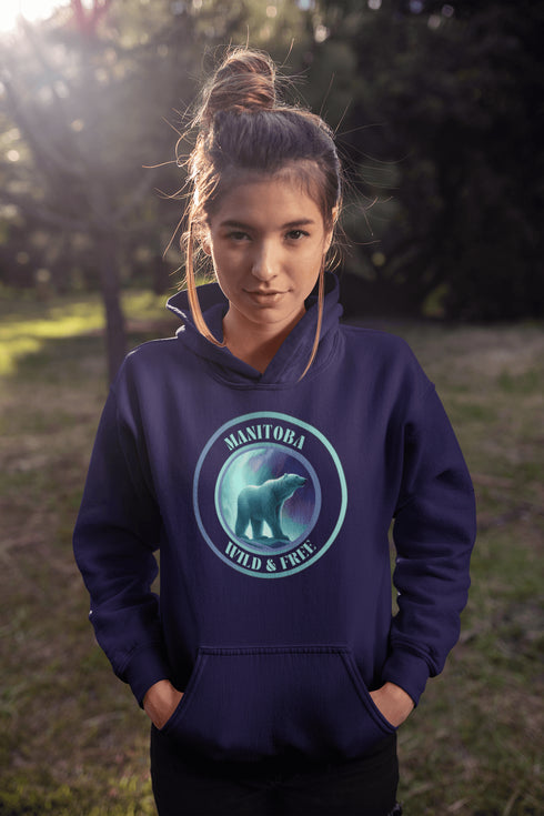 This hoodie brings the beauty of Manitoba’s north right to your wardrobe, featuring a fearless polar bear under the glow of the Northern Lights. With the bold Manitoba - Wild & Free slogan, you’ll feel the spirit of the tundra while staying wrapped in cozy warmth.
