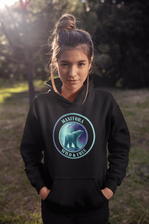This hoodie brings the beauty of Manitoba’s north right to your wardrobe, featuring a fearless polar bear under the glow of the Northern Lights. With the bold Manitoba - Wild & Free slogan, you’ll feel the spirit of the tundra while staying wrapped in cozy warmth.