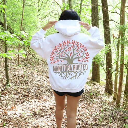 This cozy and stylish piece features a beautifully designed tree graphic with intricate roots, symbolizing the strength and heritage that ties you to this great province.