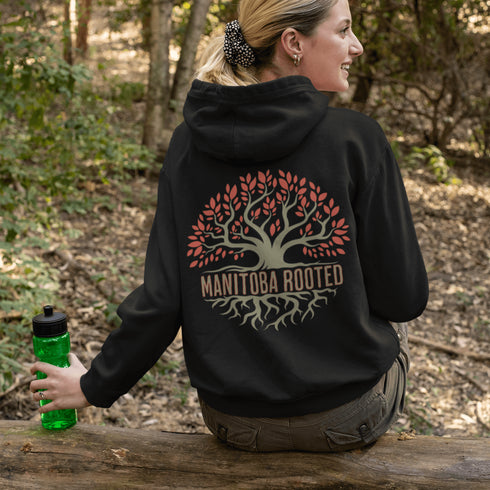 This cozy and stylish piece features a beautifully designed tree graphic with intricate roots, symbolizing the strength and heritage that ties you to this great province.