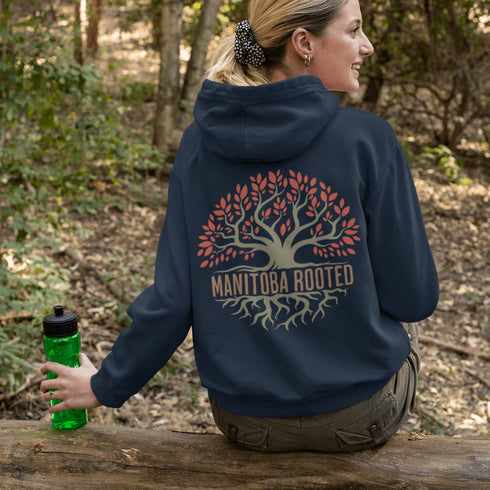 This cozy and stylish piece features a beautifully designed tree graphic with intricate roots, symbolizing the strength and heritage that ties you to this great province.