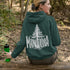 Celebrate the wild spirit of Manitoba with this eye-catching hoodie featuring "Manitoba" written in a unique tree branch font.