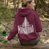 Celebrate the wild spirit of Manitoba with this eye-catching hoodie featuring "Manitoba" written in a unique tree branch font.