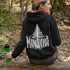 Celebrate the wild spirit of Manitoba with this eye-catching hoodie featuring "Manitoba" written in a unique tree branch font.